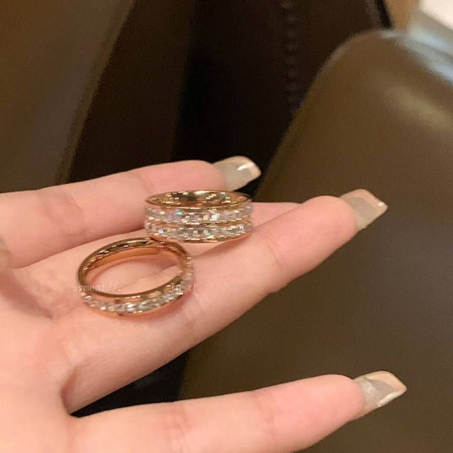 Hand holding starry diamond ring, titanium steel full diamond ring for women's gifting and daily wear