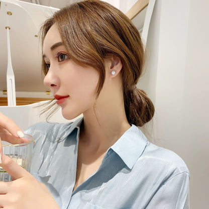 Model Wearing 1 Carat Halo Moissanite Stud Earrings, 925 Sterling Silver, Everyday Wear Luxury Earrings, Bridal Jewelry, SYG Jewelry