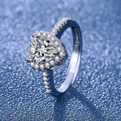 Closeup of silver clear heart CZ cluster ring, high quality jewelry, sygjewelry
