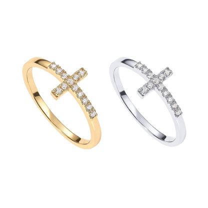 Woman wearing stackable cross ring, everyday minimalist jewelry