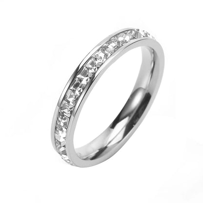 Close up detail of starry diamond ring, titanium steel texture with full diamond setting
