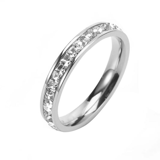Close up detail of starry diamond ring, titanium steel texture with full diamond setting
